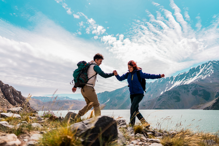 Two hikers on a mountain trail